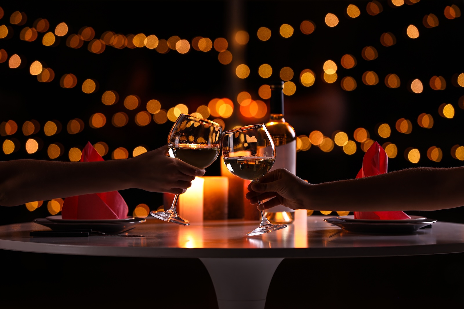 Two people clinking wine glasses | Homes at Berry Ridge | Blacksburg VA.